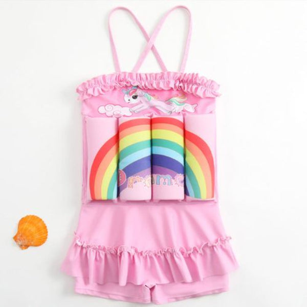 Pink swimsuit with rainbow and unicorn design on a white background
