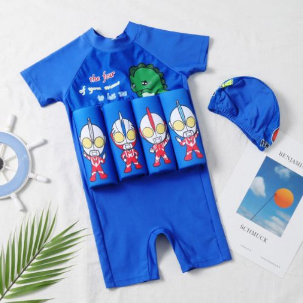 Blue children's swimsuit with cartoon characters and matching cap on a white background