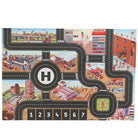 Children's play mat with fire station theme, roads, and buildings.