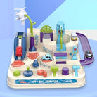 Toy city playset with cars and structures on a blue background