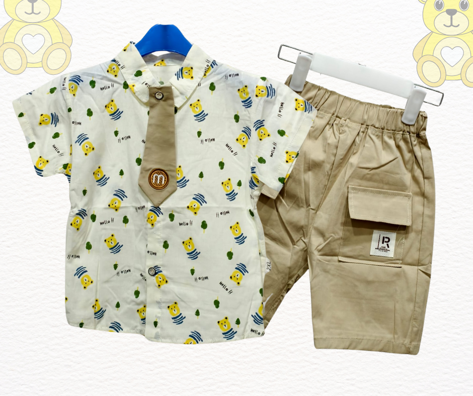 Children's outfit with patterned shirt and beige shorts on hangers against a white background