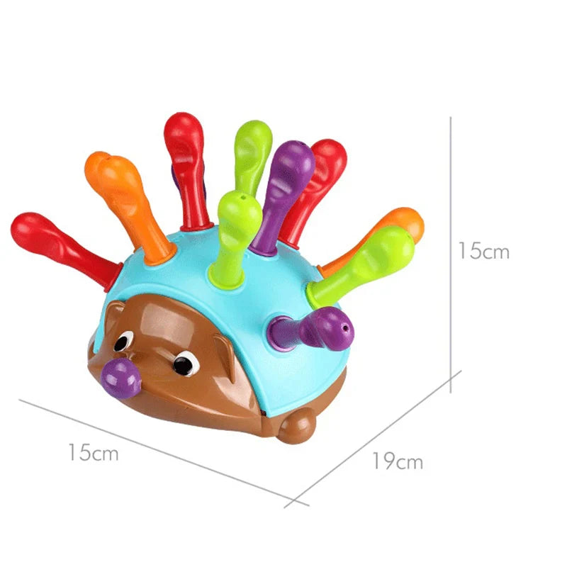 Colorful hedgehog toy with spike-like extensions on a white background