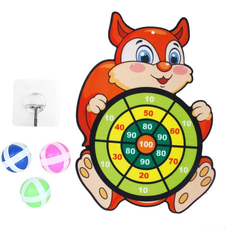 Children's dartboard with owl design and three darts on a white background